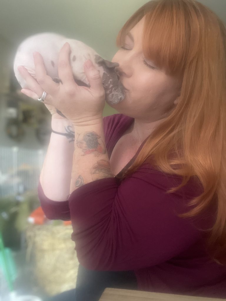 Sara Hunter with a guinea pig