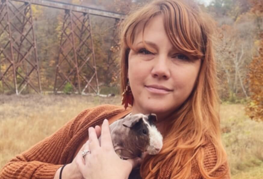Sara Hunter with guinea pig