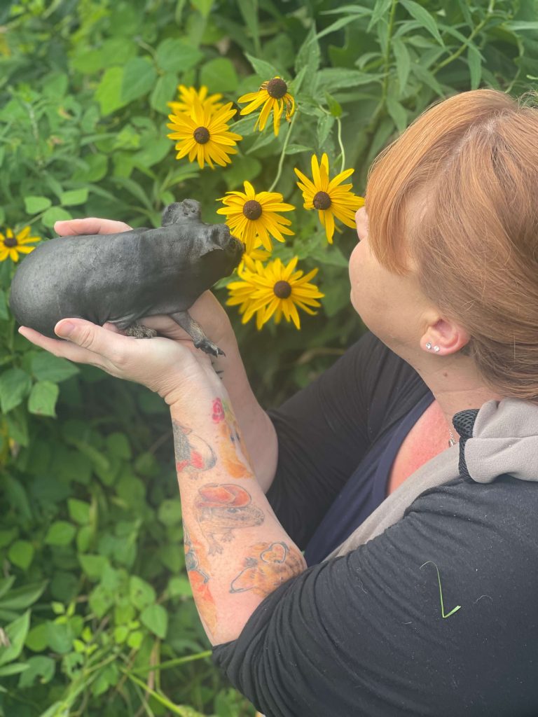 Sara with guinea pig Rooster